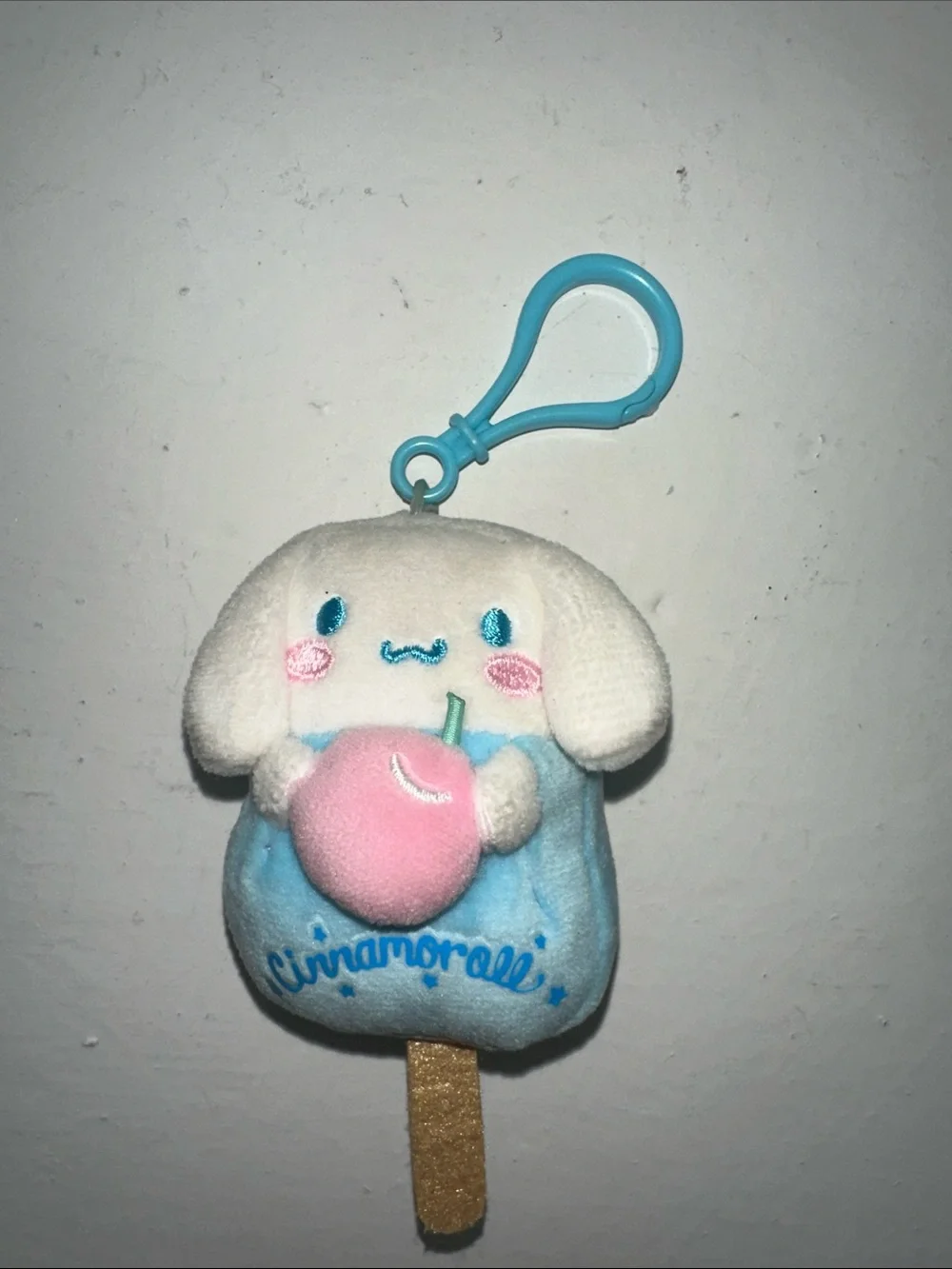 Sanrio Cinnamoroll Blue and White Plush Keychain with Pink Apple
